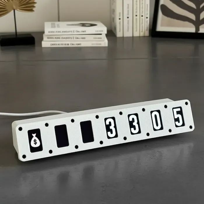 Smart-phone next to Tikky device